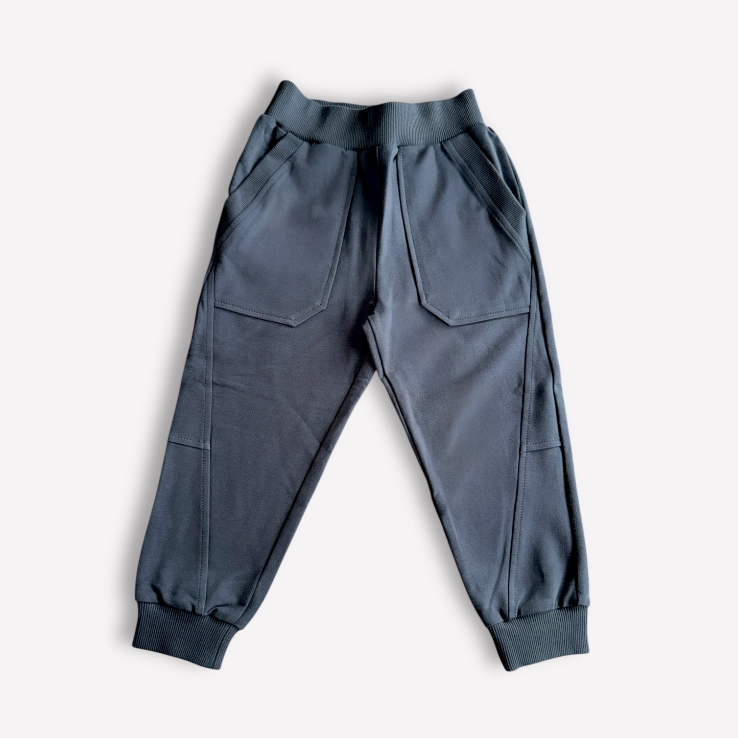 Nachhaltige Jogginghose Kinder in Grau, French Terry, mit Taschen